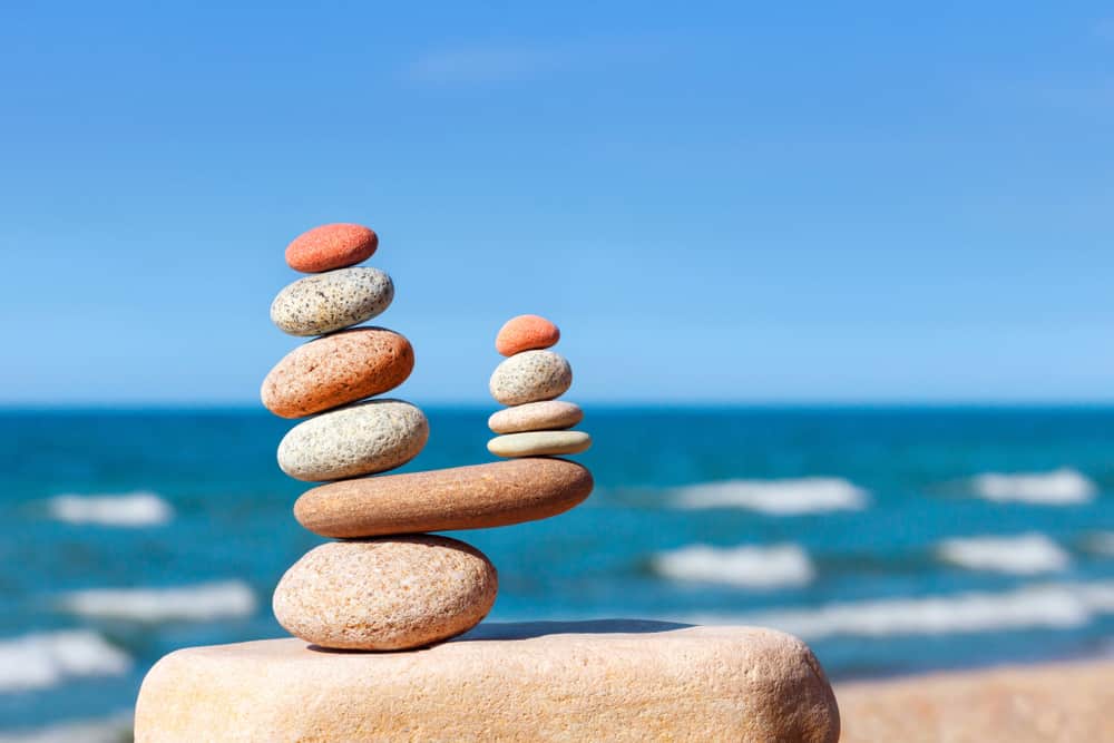 Stones balancing against ocean view