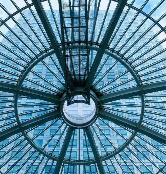 sc-cs-achilles-hero Image of a glass ceiling in large office