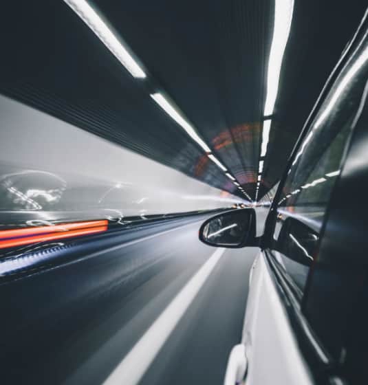 sc-cs-gforces-hero A car driving down a tunnel