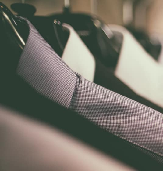 sc-cs-mossbros-hero Close up of men's suits