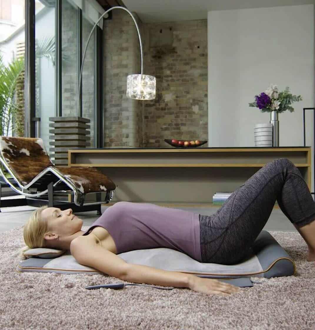 sc-cs-homedics-hero Woman doing yoga